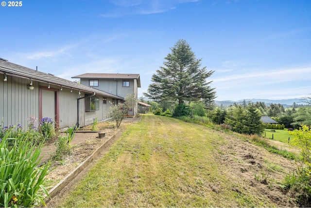 8095 Bewley St, Bay City, OR 97107 - view of green lawn with a mountain view
