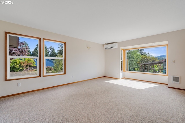 8095 Bewley St, Bay City, OR 97107 - carpeted spare room with a wall mounted air conditioner, baseboards, and heating unit