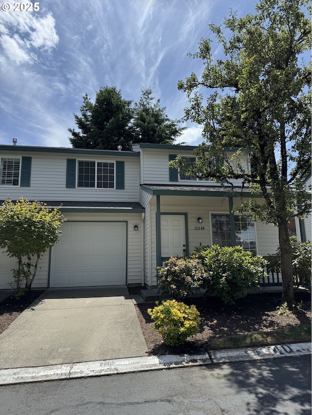 15340 SW Lexington Ln, Beaverton, OR 97007 - view of front of house with a garage and driveway