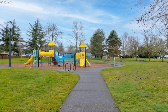 view of jungle gym with a yard