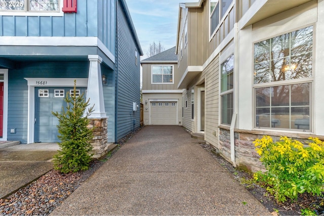 view of side of property featuring a garage