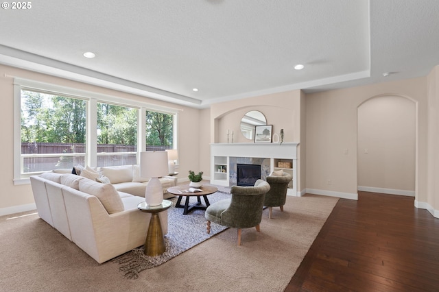 14609 NE 112th St, Vancouver, WA 98682 - living area with hardwood / wood-style floors, plenty of natural light, a tile fireplace, baseboards, and recessed lighting