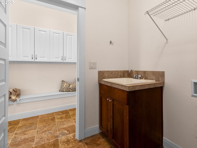 14609 NE 112th St, Vancouver, WA 98682 - bathroom featuring baseboards, vanity, and stone finish floors