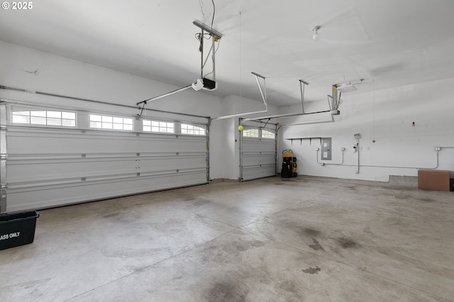 14609 NE 112th St, Vancouver, WA 98682 - garage featuring electric panel and a garage door opener