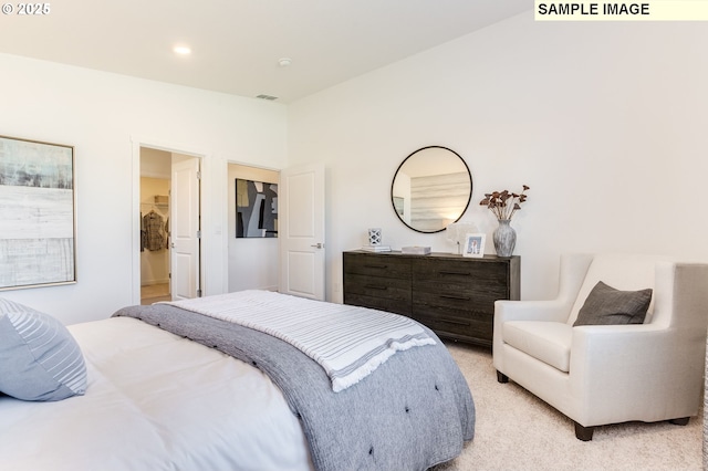 bedroom featuring lofted ceiling, light carpet, visible vents, and recessed lighting