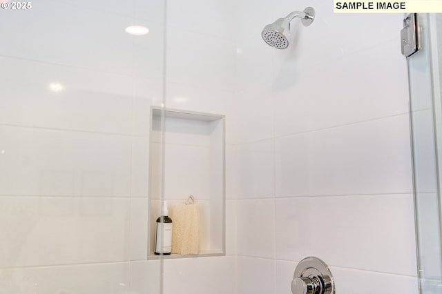 details featuring a tile shower