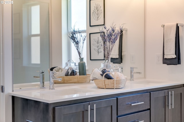 bathroom featuring double vanity and a sink