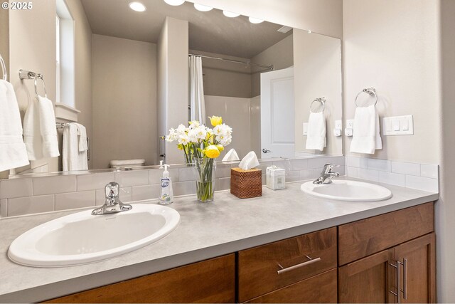 51013 Mckenzie Hwy, Vida, OR 97488 - bathroom with double vanity, tasteful backsplash, and a shower with curtain