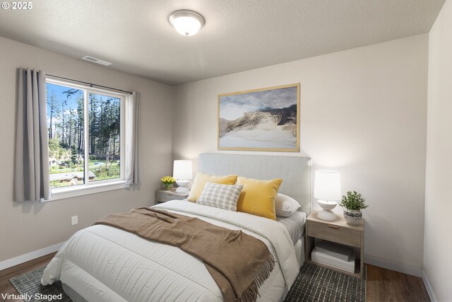 51013 Mckenzie Hwy, Vida, OR 97488 - bedroom with wood finished floors and baseboards