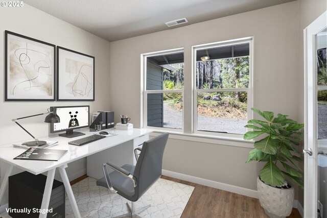 51013 Mckenzie Hwy, Vida, OR 97488 - office area with wood finished floors and baseboards
