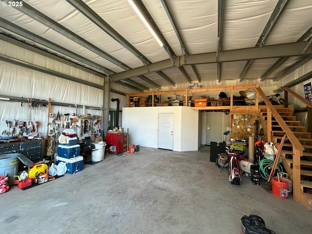 garage with a workshop area