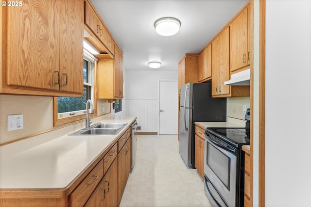 kitchen with appliances with stainless steel finishes and sink