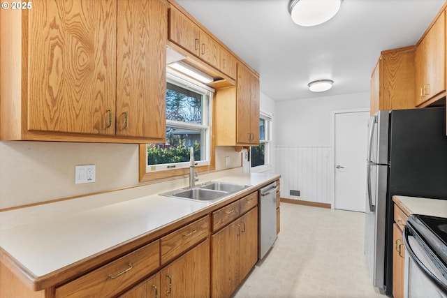 kitchen featuring stainless steel appliances and sink