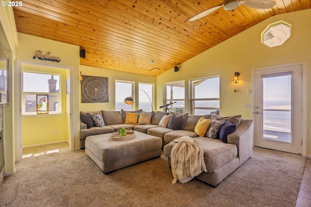 962 SW Waziyata Ave, Waldport, OR 97394 - living room with vaulted ceiling, a ceiling fan, carpet flooring, and wooden ceiling
