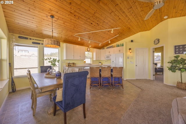 962 SW Waziyata Ave, Waldport, OR 97394 - dining room featuring wooden ceiling, a ceiling fan, high vaulted ceiling, and track lighting