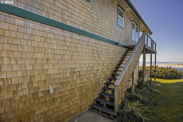 962 SW Waziyata Ave, Waldport, OR 97394 - view of side of home featuring view of water and beach and stairway