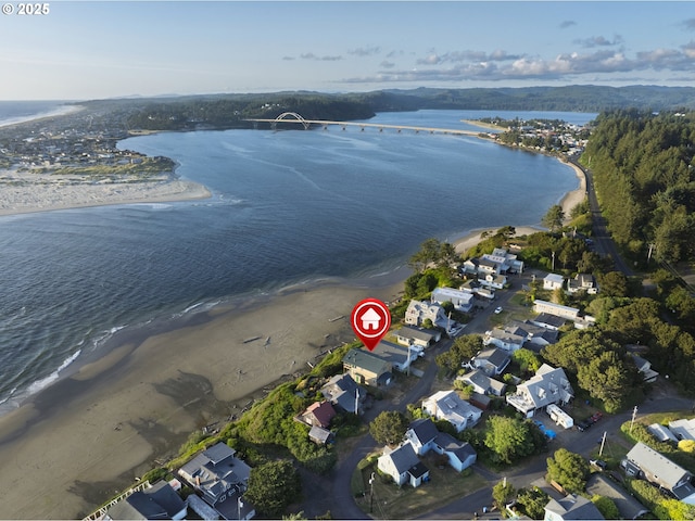 962 SW Waziyata Ave, Waldport, OR 97394 - aerial overview of property's location with a nearby body of water and nearby suburban area