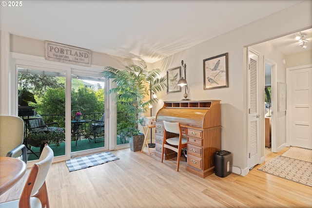 office space with wood finished floors