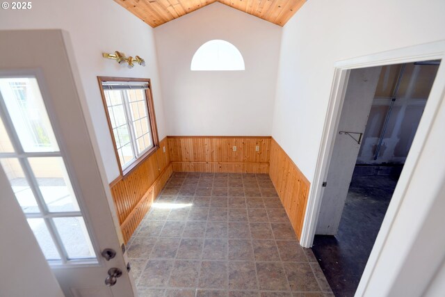 2525 Pine St, Seaside, OR 97138 - corridor featuring wooden walls, a wainscoted wall, wooden ceiling, and lofted ceiling