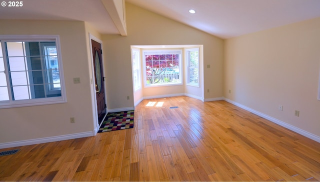 2525 Pine St, Seaside, OR 97138 - entrance foyer featuring light wood-style floors, vaulted ceiling, baseboards, and recessed lighting