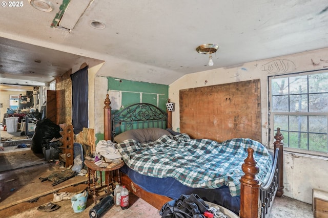 bedroom with vaulted ceiling