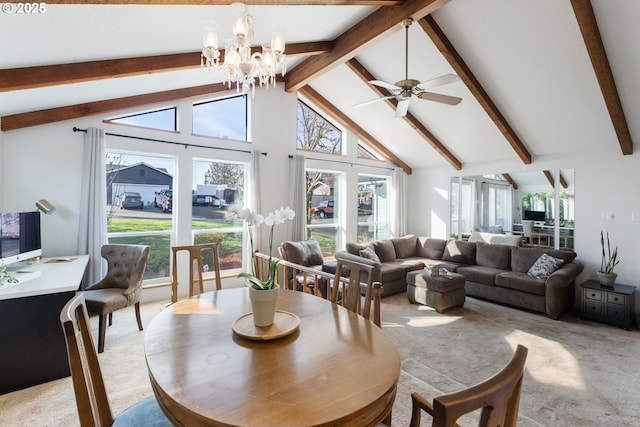 dining space with an inviting chandelier, beamed ceiling, light colored carpet, and high vaulted ceiling