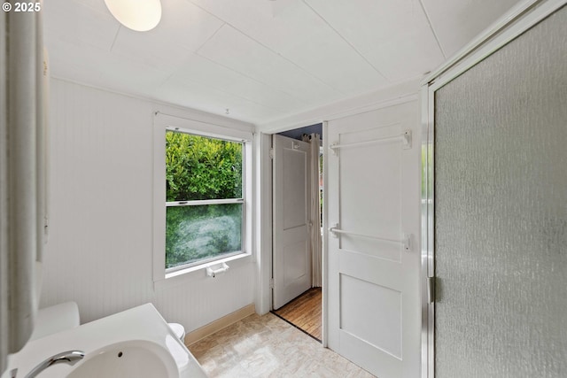 2479 Sherman Ave, North Bend, OR 97459 - full bath featuring a sink, a shower stall, and toilet