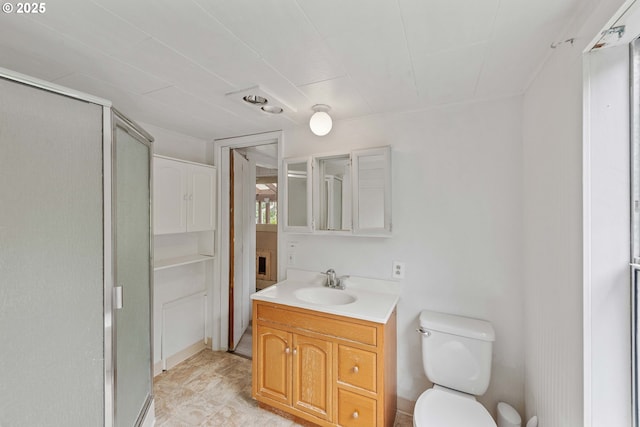 2479 Sherman Ave, North Bend, OR 97459 - full bath with a shower stall, vanity, and toilet