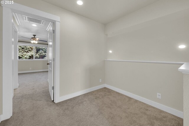 empty room featuring recessed lighting, carpet, a ceiling fan, and baseboards