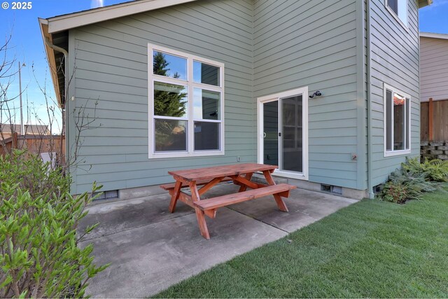 view of patio / terrace featuring fence and outdoor dining area