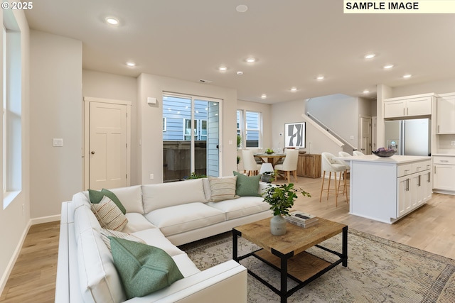 949 Legacy St, Eugene, OR 97402 - living area with light wood-type flooring, recessed lighting, and stairway