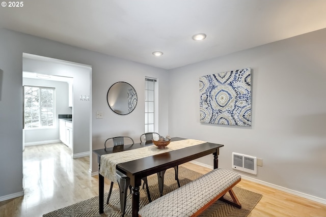 dining space featuring light hardwood / wood-style flooring