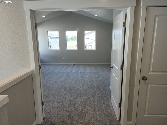 2911 Olympic St Unit 25, Woodburn, OR 97071 - kitchen with a kitchen island, light countertops, stainless steel appliances, white cabinetry, and a sink
