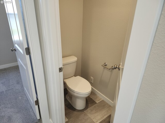 2911 Olympic St Unit 25, Woodburn, OR 97071 - kitchen with a sink, light countertops, white cabinetry, and stainless steel appliances