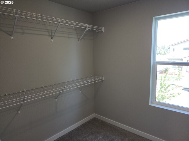 2911 Olympic St Unit 25, Woodburn, OR 97071 - interior details featuring a sink, tasteful backsplash, light countertops, and white cabinetry