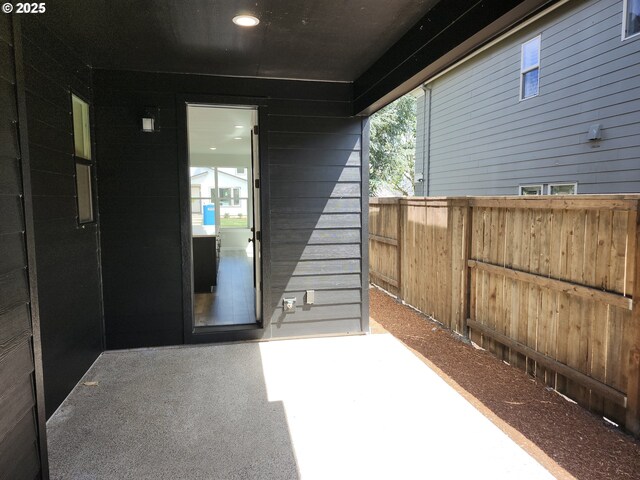 2911 Olympic St Unit 25, Woodburn, OR 97071 - view of patio featuring fence