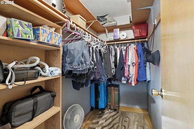 2112 SE 148th Pl, Portland, OR 97233 - walk in closet with wood finished floors
