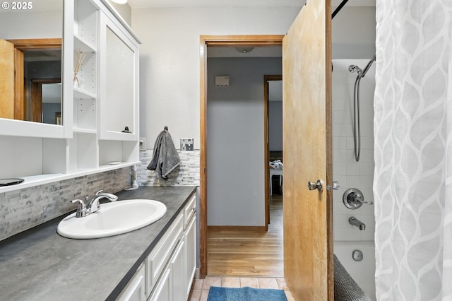 2112 SE 148th Pl, Portland, OR 97233 - full bathroom featuring vanity, shower / tub combo with curtain, and tasteful backsplash