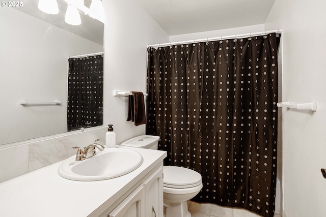 bathroom featuring toilet, vanity, tile patterned flooring, and a shower with shower curtain