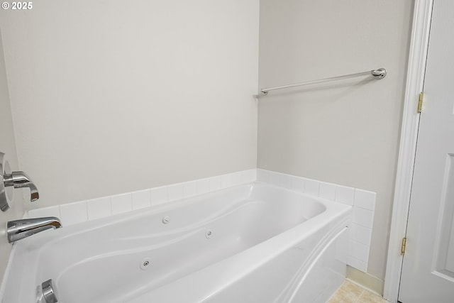 bathroom with a whirlpool tub