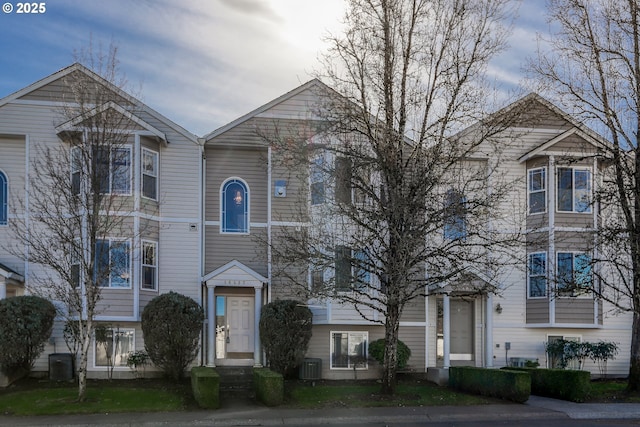 view of front of home featuring cooling unit