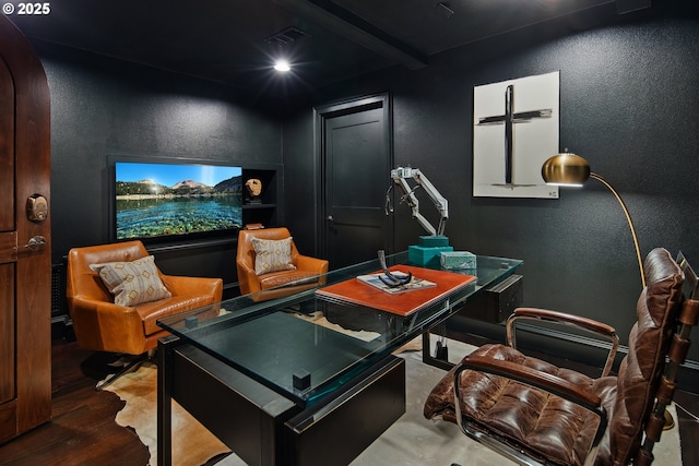 office with hardwood / wood-style flooring and beamed ceiling