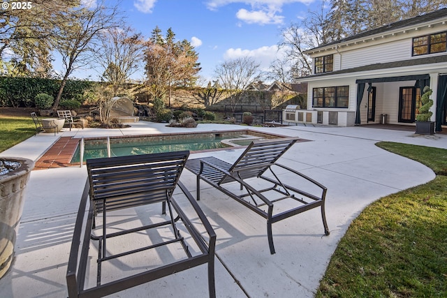 view of patio with a fenced in pool