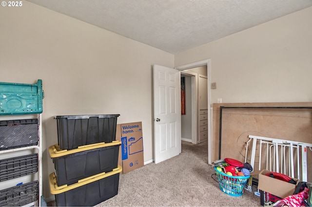 rec room with carpet flooring and baseboards
