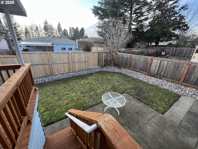 view of yard with a fenced backyard