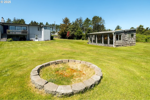 90431 Lewis Rd, Warrenton, OR 97146 - view of grassy yard with a deck