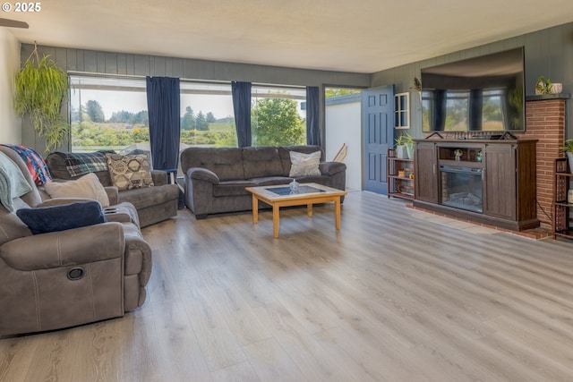 90431 Lewis Rd, Warrenton, OR 97146 - living area featuring wood finished floors and a glass covered fireplace