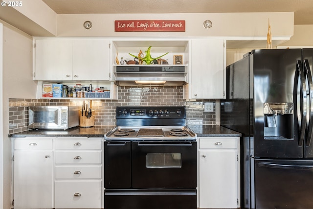 kitchen featuring backsplash, white cabinetry, dark stone counters, black appliances, and range hood