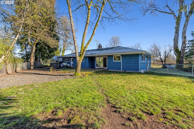 ranch-style home with a front yard