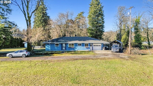 single story home with a garage, a front lawn, and a carport